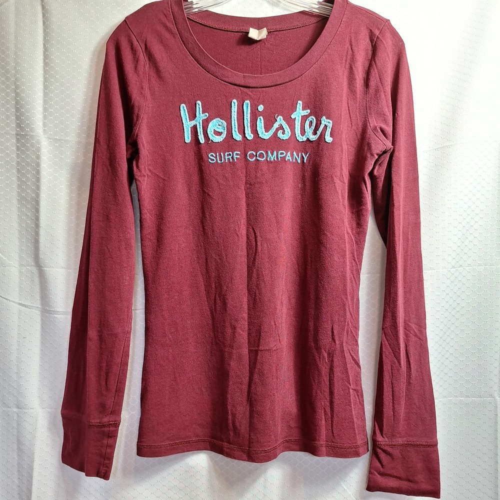 Hollister Long Sleeve Logo Tee in Burgundy with Light Blue Script